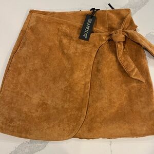 Brand new with tags Blank NYC faux suede skirt.